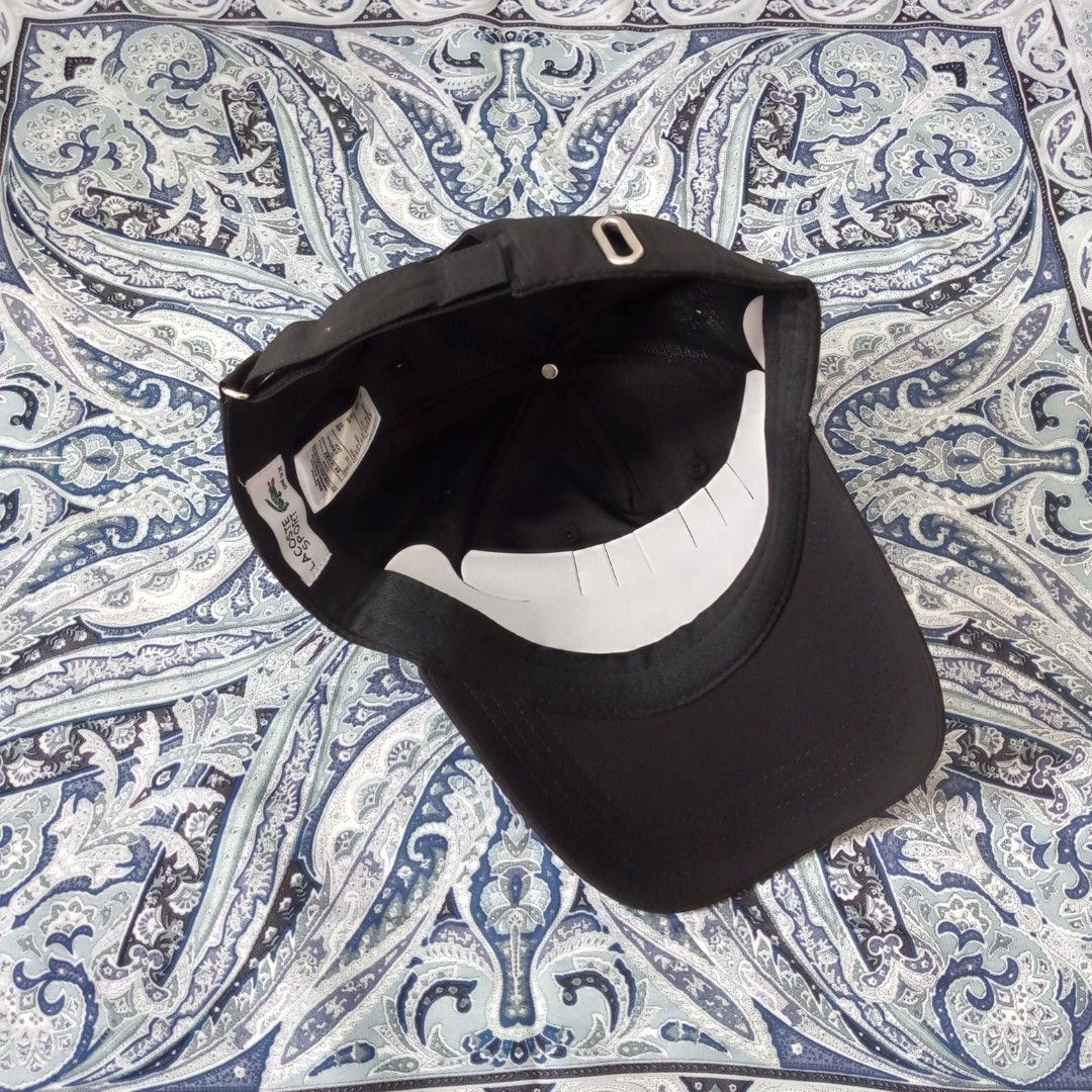 Lacoste Sport Black Cap TH7516 (Category: Caps & Hats) located in Manila. Submitted by pablopresk0. (Listing ID 1470091548, Image 3). Description: - Brand: Lacoste Sport - Style: TH7516 - Color: Black with white front logo and green crocodile patch - Material: Comfortable cotton and elastane blend - Size: One size with adjustable back strap for a custom fit - Condition: Excellent, clean inner sweatband, tags intact - Perfect for daily wear or spo