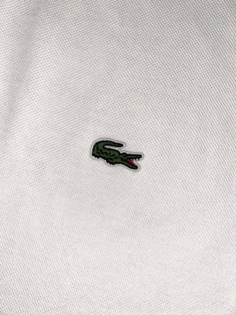Lacoste White (Category: Tshirts & Polo Shirts ) located in Bulacan. Submitted by huntsofryxk (Listing ID 1469894132, Image 2). Description: Lacoste White size 7 XXL on tag color rate 9.8/10 brand new condition no issue mine 1500 location: sjdm, bulacan.