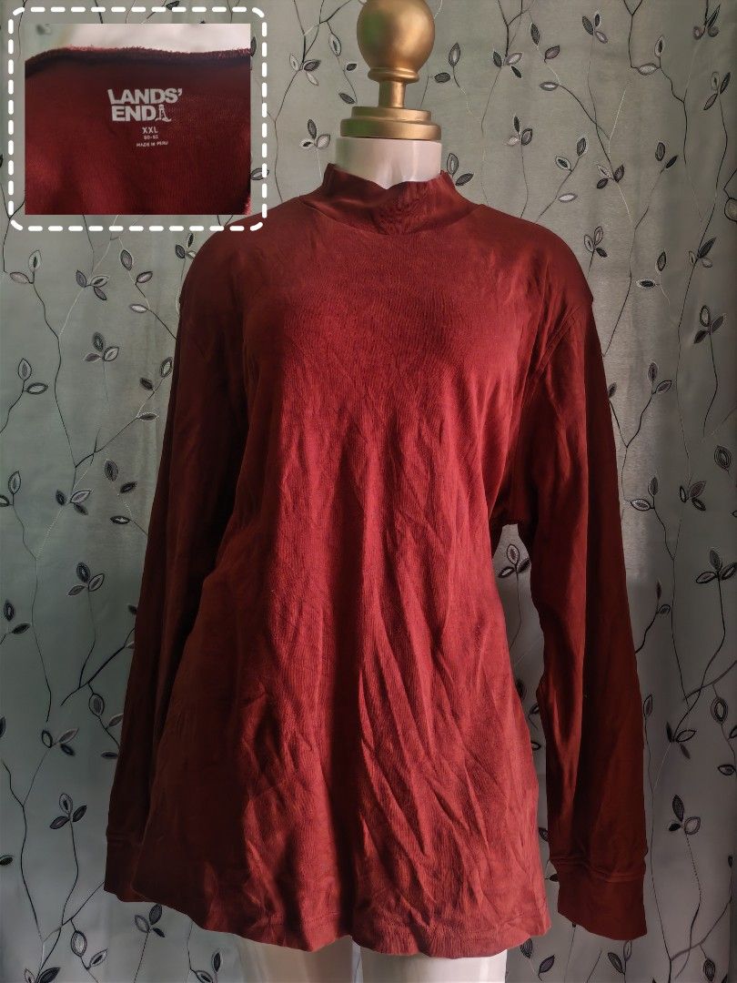 Lands' End Mock Neck Long Sleeve Top Rust XXL (Category: Longsleeves) located in Caloocan City. Submitted by _misskaye (Listing ID 1470043393, Image 1). Description: - Brand: Lands' End - Style: Mock neck top with long sleeves and a relaxed fit - Size: XXL (50-52 sizing) - Color: Rich rust / dark orange-red (solid) - Material: Soft, comfortable fabric made in Peru - Condition/Feature: Perfect for layering under jackets or wearing on its own durin