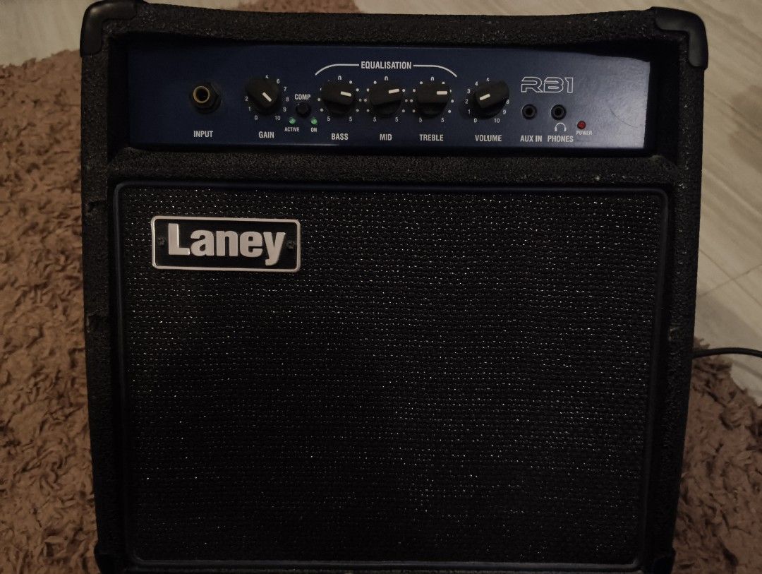 Laney RB1 Richter Bass Amplifier (Category: Musical Instruments) located in Rizal. Submitted by norkizz92 (Listing ID 1470035498, Image 1). Description: - Brand: Laney RB1 Richter Bass Amplifier - Power: 15-watt practice amp - Features: Built-in compressor and 3-band EQ - Connectivity: Headphone jack and aux input - Design: Stylish blue control panel with black textured finish - Condition: Perfect, solid gear for home practice sessions.