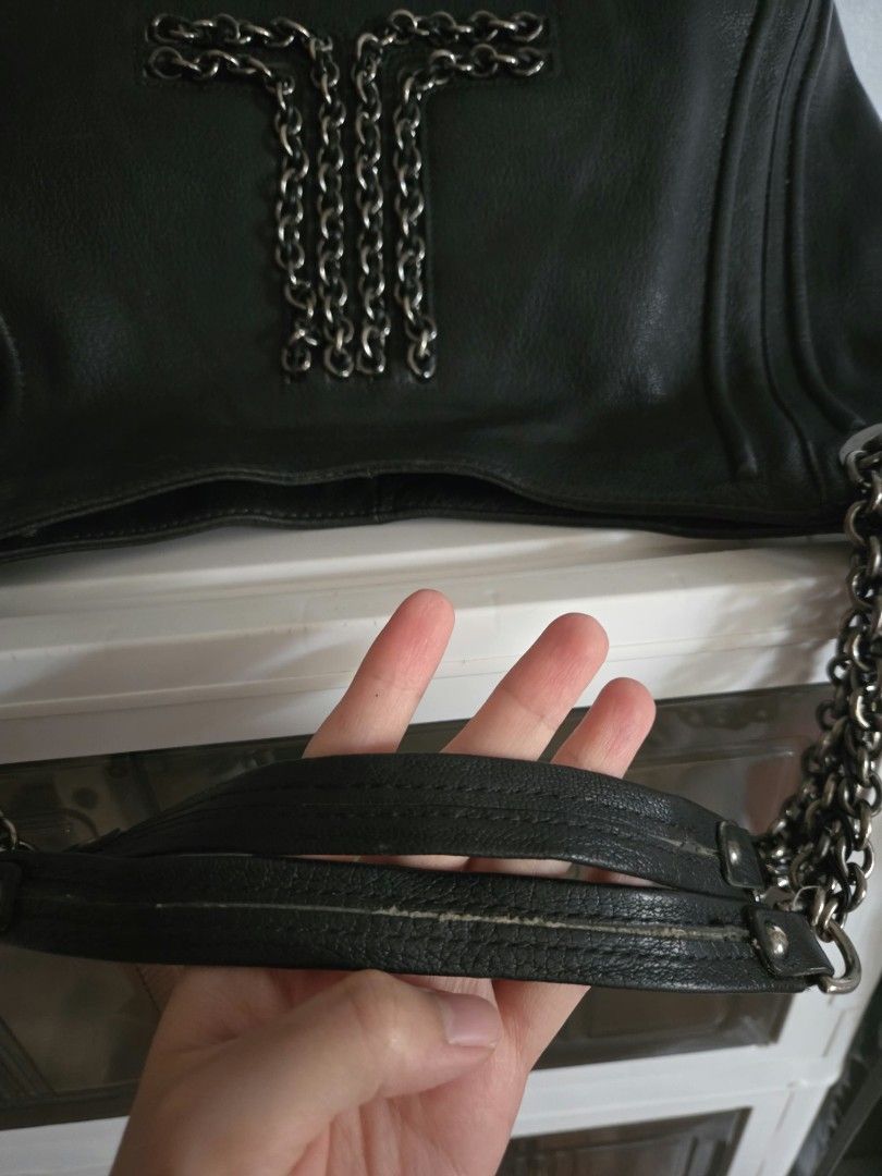 Lanvin Black Hobo Tote Bag (Category: Shoulder Bags) located in Bangued. Submitted by shopaholic.girliee. (Listing ID 1469991488, Image 3). Description: Pretty in person very chanel vibes. - Color: Black - Material: Genuine Leather - Accents: Chunky silver-tone chain on the front and dual shoulder straps with comfortable leather top sections - Pockets: Exterior slip pocket on the back - Interior: Roomy and spacious for everyday essentials - Rank 