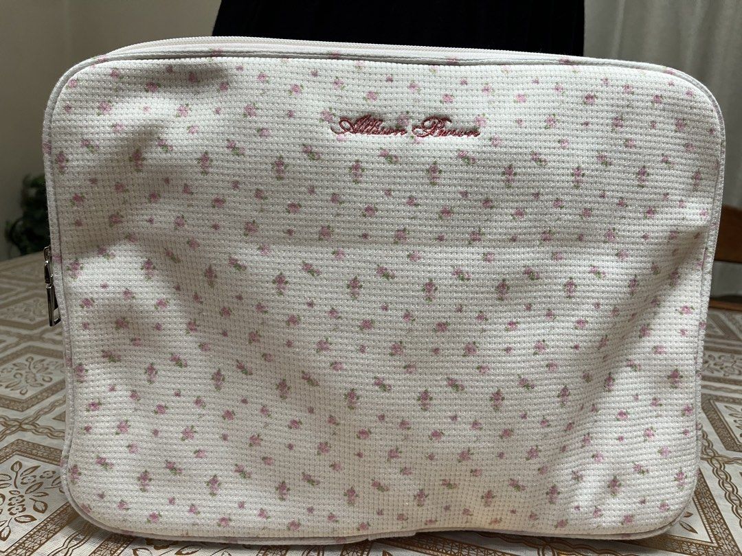 Laptop bag (Category: Purses & Pouches) located in Bacoor. Submitted by ayit. (Listing ID 1470059706, Image 1). Description: Orig new japan gling sf inc - Type: Laptop bag / pouch - Design: White with pink floral pattern exterior - Interior: Pink gingham check lining with extra compartment - Closure: Secure top zip - Condition: Good, well-maintained - Perfect for daily commute, school, or work.