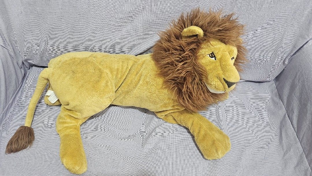 Large plush lion stuffed toy with fluffy mane (Category: Plushies & Soft Toys) located in San Jose del Monte. Submitted by stellarbeauty (Listing ID 1469950054, Image 1). Description: - Big, life-sized sleeping lion plush toy - Soft golden fur with dark brown mane and tail tuft - Great huggable companion for kids - Perfect for cute room decor.