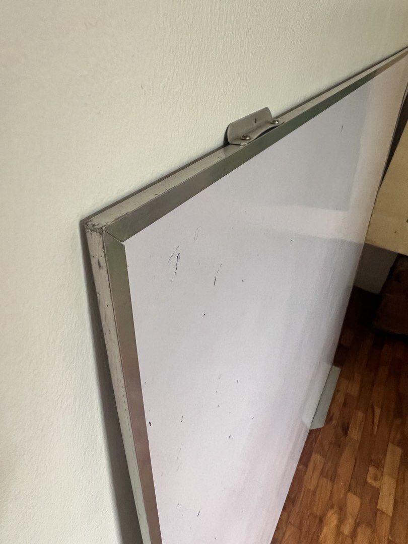 Large Wall Mounted Whiteboard 48 Inches (Category: Office Furniture & Fixtures) located in Makati City. Submitted by wonthriftyph (Listing ID 1469982762, Image 2). Description: - Size: 48 inches across - Frame: Durable aluminum with sturdy wooden backing - Condition: Minor scuffs and marks from regular use - Features: Includes mounting brackets attached at the top - Ideal for: Home office, bedroom, or study space -Original price was 3.9K - Delive