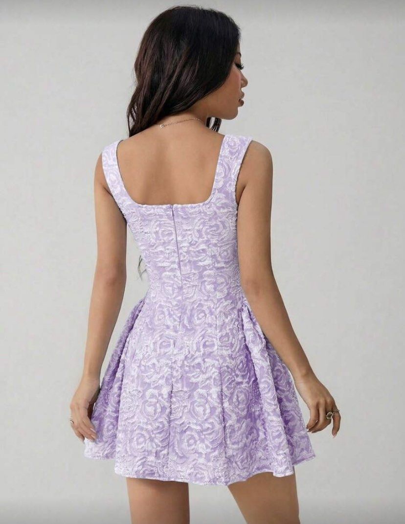 Lavender Rose Jacquard Square Neck Mini Dress (Category: Dresses) located in Mandaue City. Submitted by pinkbarbiethriftshop (Listing ID 1470006841, Image 2). Description: - Color: Lilac - Design: Textured rose jacquard pattern throughout - Details: Square neckline, thick straps, fitted bodice, flared pleated skirt - Closure: Back zipper - Condition: brand new.