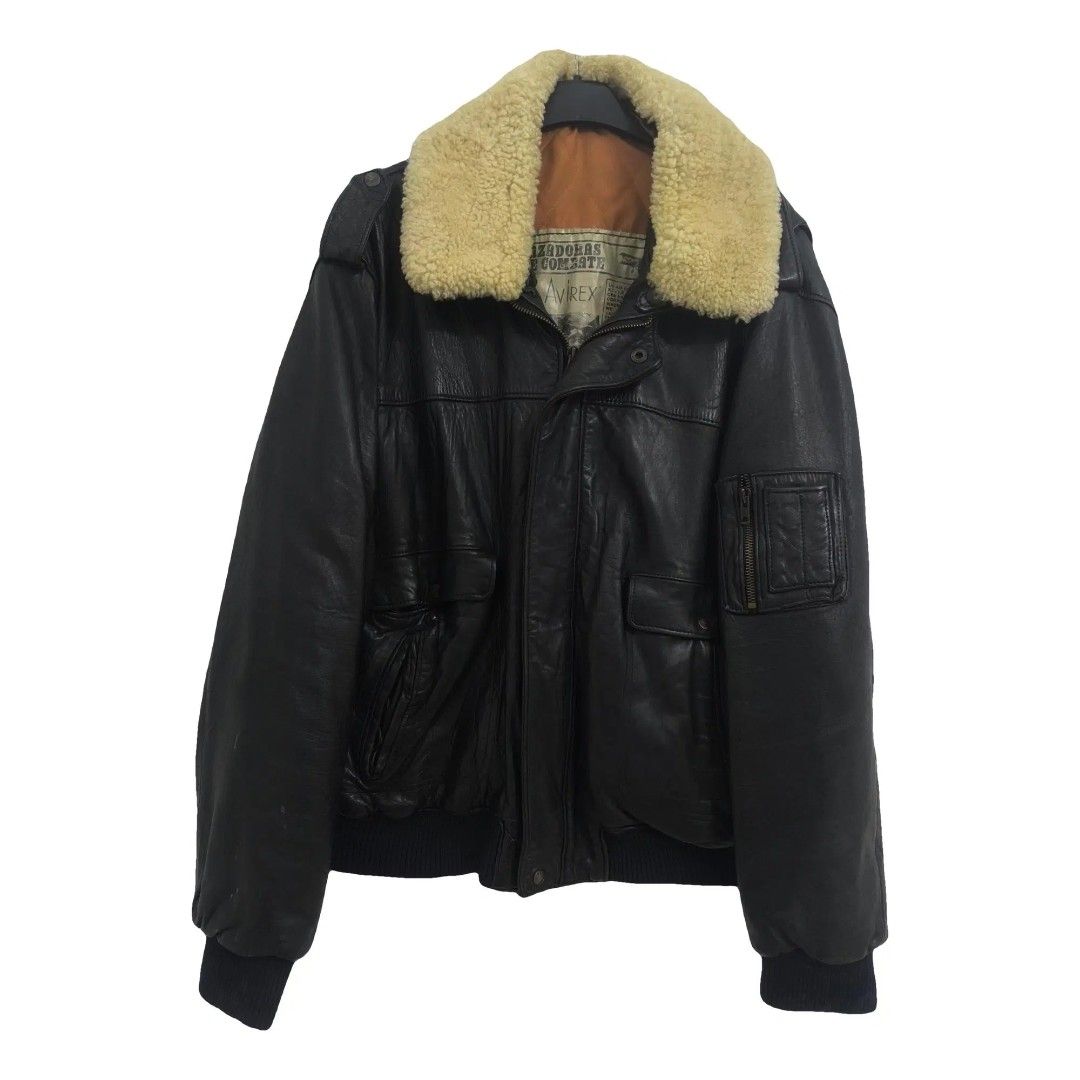 Leather Bomber Jacket with Shearling Collar (Category: Coats, Jackets and Outerwear) located in Quezon City. Submitted by cuteitemsonlyyy (Listing ID 1469990138, Image 1). Description: - Authentic vintage black heavy leather bomber jacket - Genuine leather shell with natural, well-maintained broken-in texture - Cozy and warm cream-colored shearling collar - Quilted inner lining for extra warmth during cold days - Multiple front pockets and signat