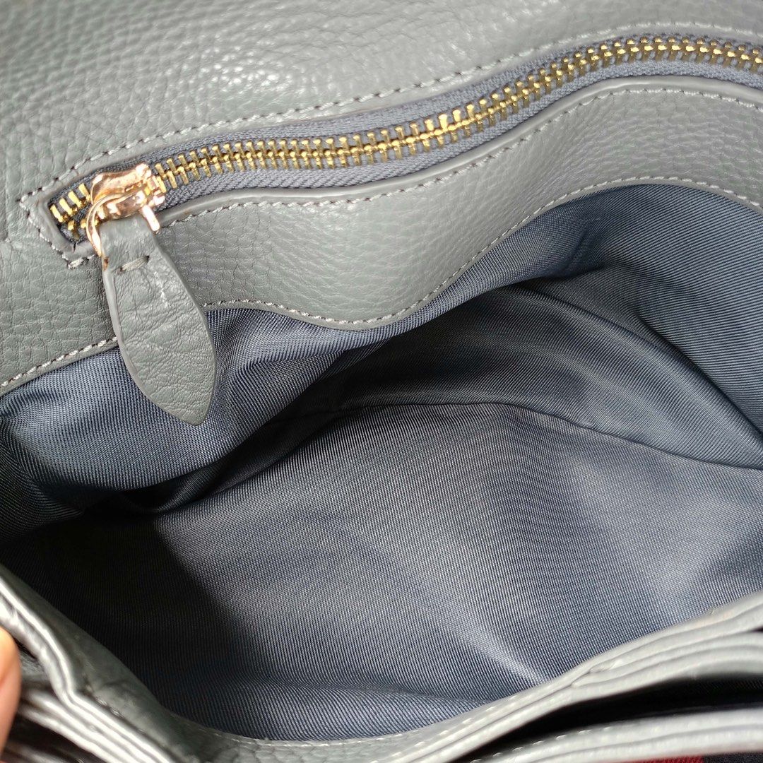 Leather sling bag (Category: Cross-body Bags) located in Barugo. Submitted by green.trendsetter (Listing ID 1470139852, Image 2). Description: PRELOVED MEANS PRELOVED. Each piece has been previously loved and may naturally have signs of use such as creasing, scratches, stains, discoloration, or other imperfections. Kindly manage your expectations accordingly. •We kindly ask for no fussy buyers. • Photos of bag’s details and other identifying feat
