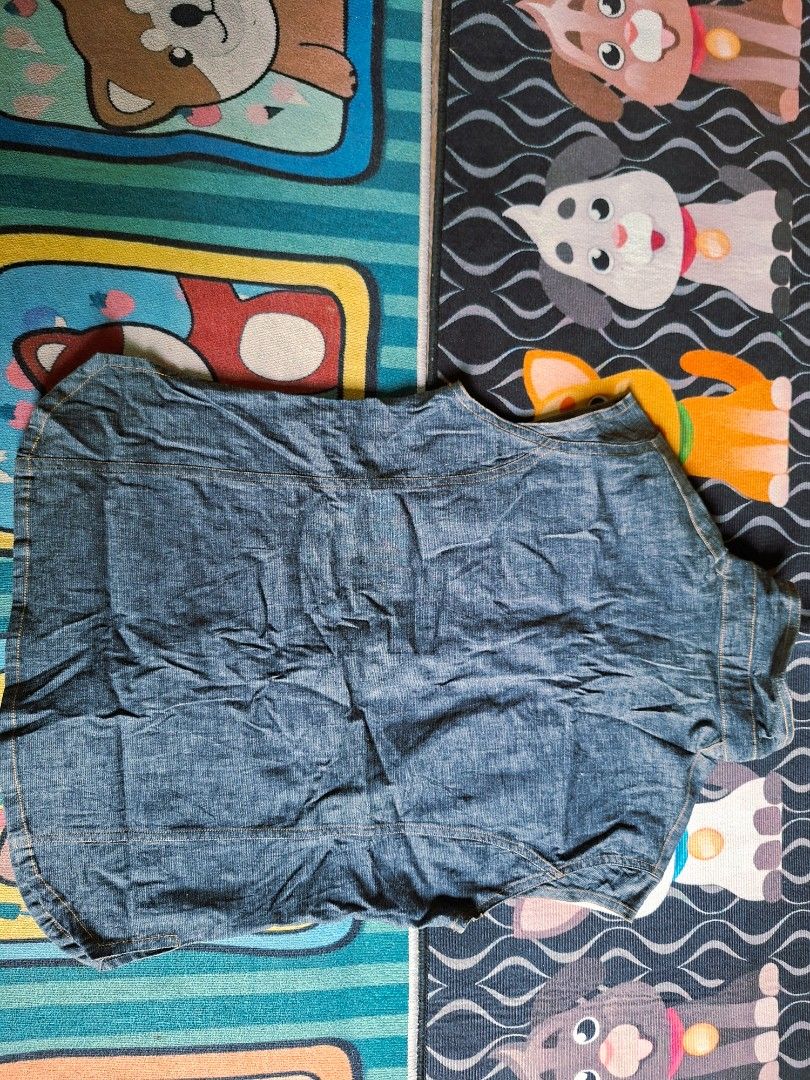 Lee Cooper Sleeveless Denim Vest Size M (Category: Sleeveless) located in San Francisco. Submitted by manu2025 (Listing ID 1470138751, Image 2). Description: - Brand: Lee Cooper - Style: Sleeveless denim vest / layering piece - Color: Dark blue wash - Size: Medium (M) - Material: Cotton-lycra blend with slight stretch for comfort - Details: Snap-button front closure, dual chest pockets, structured high collar, and tailored back panel seams.