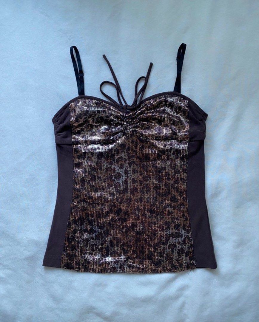 Leopard Glitter print bow top (Category: Sleeveless) located in Manila. Submitted by declutterbylish (Listing ID 1469988311, Image 1). Description: .