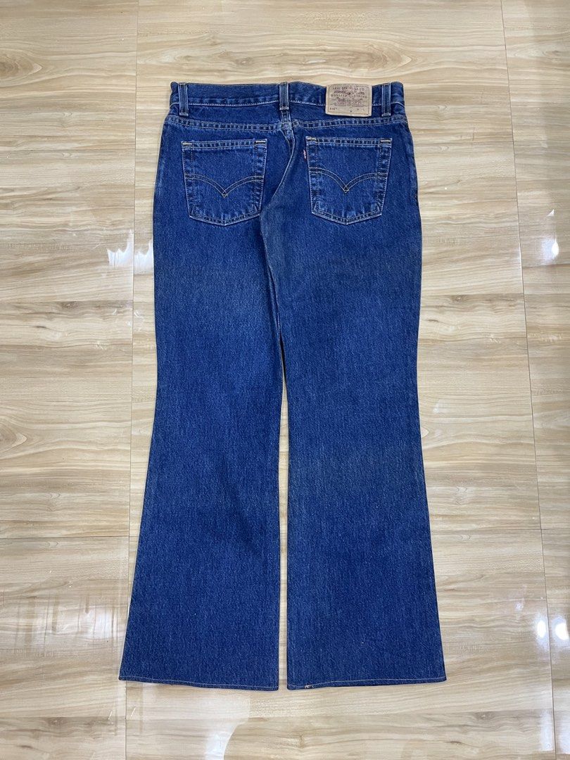 Levi's 518 Bootcut Jeans (Category: Jeans) located in Angeles City. Submitted by thriftsij (Listing ID 1470050342, Image 3). Description: - Brand: Levi's 518 -28w 36l Lo9 - Color: Dark blue denim - Size: Medium (M) - Super low bootcut jeans - Fit: Classic bootcut leg style with contrast stitching - Details: Signature five-pocket setup, leather back patch, and red tab branding - Material: Sturdy, durable denim fabric.