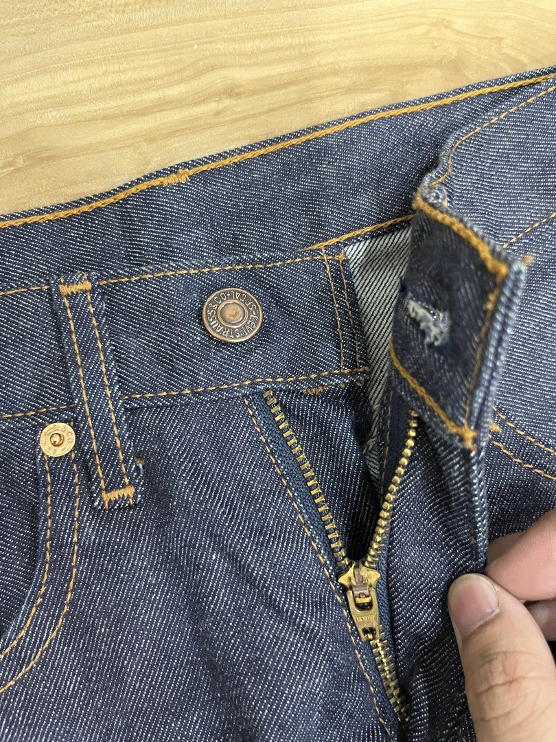 Vintage Levi's 558 bootcut jeans (Category: Jeans) located in Angeles City. Submitted by thriftsij (Listing ID 1470051183, Image 2). Description: - Brand: Levi's 558 Raw denim - Color: Dark blue - Style: Bootcut leg, classic five-pocket styling - Size: w26 L41 LO8 - Material: 98% cotton, 2% polyurethane - Details: Brass-tone hardware, metal button fly closure - Origin: Made in Philippines - Condition: Clean condition all around.
