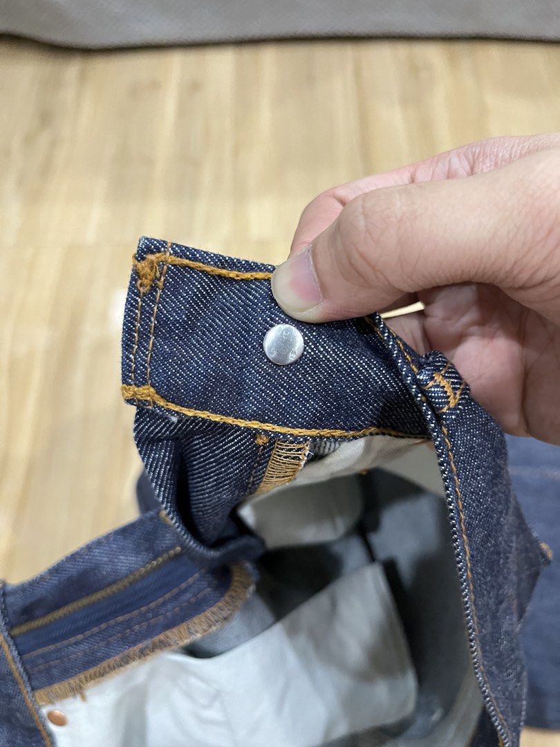 Vintage Levi's 558 bootcut jeans (Category: Jeans) located in Angeles City. Submitted by thriftsij (Listing ID 1470051183, Image 3). Description: - Brand: Levi's 558 Raw denim - Color: Dark blue - Style: Bootcut leg, classic five-pocket styling - Size: w26 L41 LO8 - Material: 98% cotton, 2% polyurethane - Details: Brass-tone hardware, metal button fly closure - Origin: Made in Philippines - Condition: Clean condition all around.
