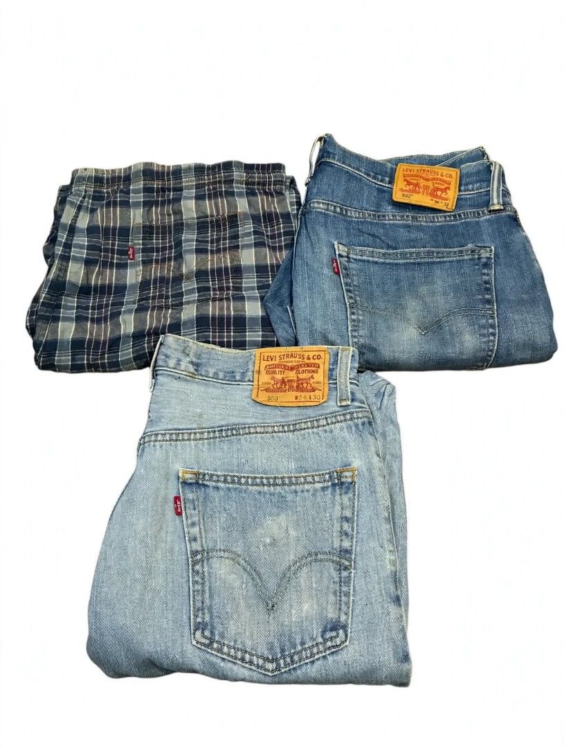 Levi's denim jeans and plaid shorts bundle (Category: Shorts) located in Manila. Submitted by lesther.gem (Listing ID 1470076724, Image 1). Description: - Bundle of 3 versatile bottoms for everyday rotation - 1x Levi's 550 classic blue jeans with leather back patch - 1x Levi's 502 classic blue jeans with leather back patch - 1x Plaid lounge shorts with comfy elastic waistband and signature red Levi's tab - Selling as a complete set only.