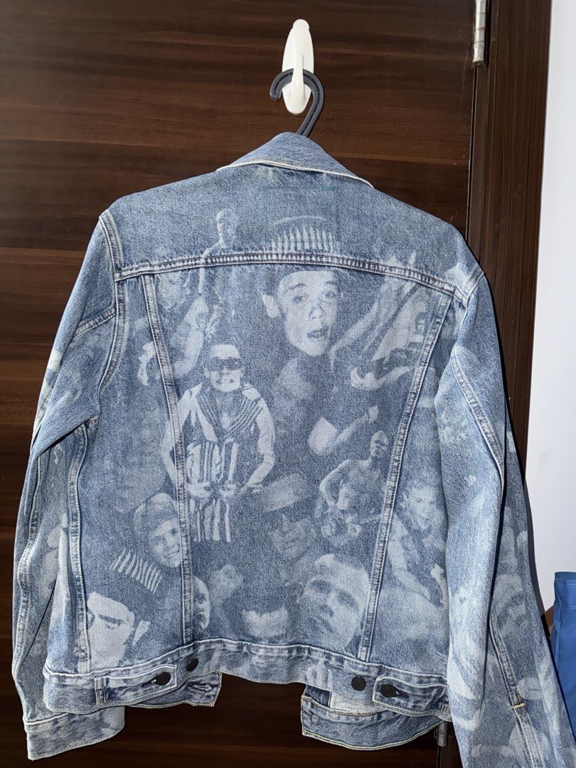 Levi's Fleavi Collab Denim Jacket (UNISEX) (Category: Coats, Jackets and Outerwear) located in Mandaluyong City. Submitted by kadynkelsey (Listing ID 1470037833, Image 3). Description: - Brand: Levi's - Size: S -Loose fit - Design: Loose fit Unique bleached all-over photo print wash covering front, back, and sleeves - Features: Classic button-up front, dual chest pockets, and collar - Material: Sturdy denim - Condition/Style: Great statement piec