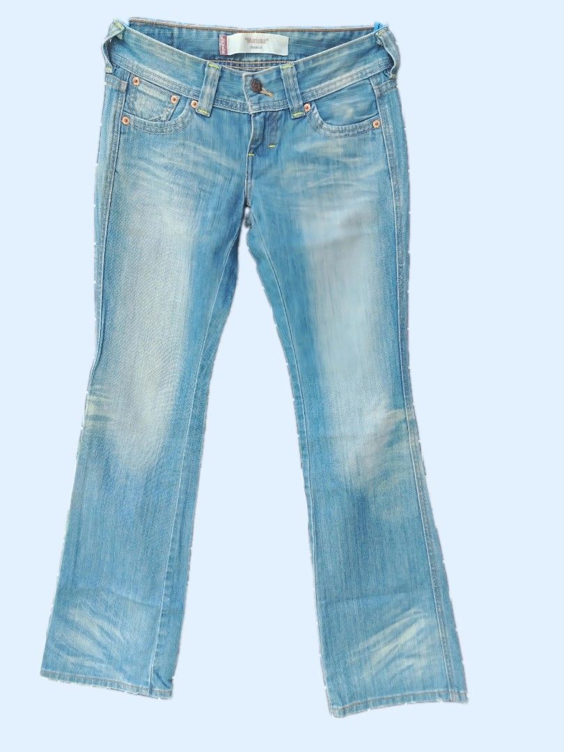 Levi's Marissa Bootcut Jeans Light Wash (Category: Jeans) located in Davao. Submitted by enchanted08 (Listing ID 1469973608, Image 1). Description: - Brand: Levi's (Marissa Bootcut) - Color/Wash: Light blue with front thigh whiskering - Rise: Mid-to-low rise fit - Details: Classic five-pocket styling, copper rivets, button closure, and contrast stitching - Condition: Excellent, ready to wear - Perfect for pairing with sneakers or boots! - fits 28