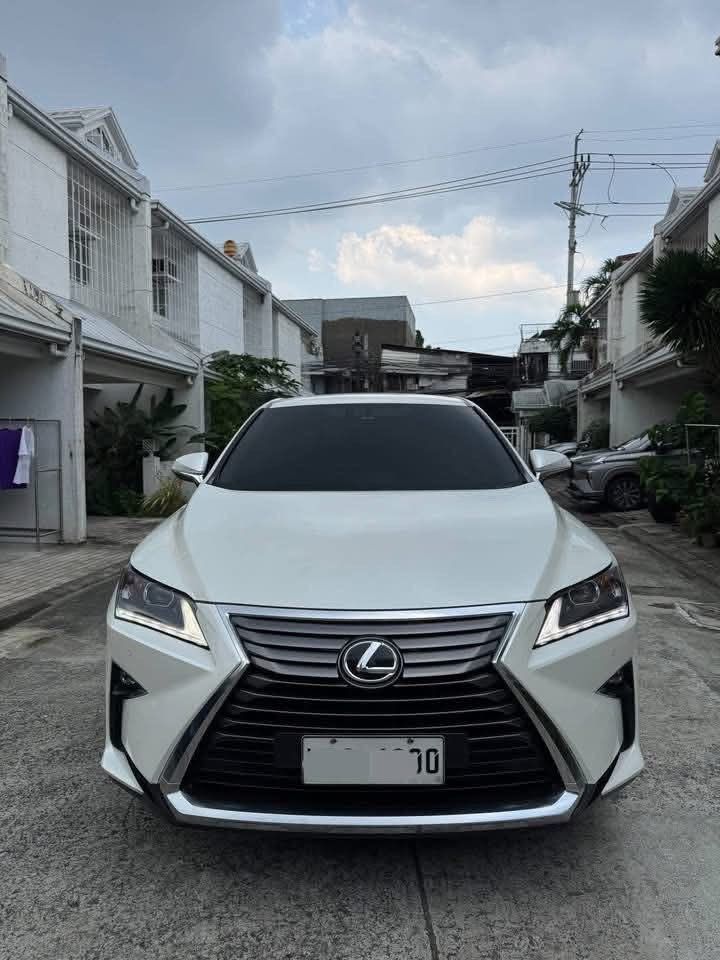 Lexus RX350 3.5 Auto (Category: Used Cars) located in Manila. Submitted by quality_cars (Listing ID 1470117579, Image 1). Description: 2018 Lexus RX350 3.5 ACQUIRED 2019 Matic / Gasoline Price: 1.595m 𝙒𝙀 𝘼𝘾𝘾𝙀𝙋𝙏 𝙏𝙍𝘼𝘿𝙀 𝙄𝙉 𝘼𝙉𝘿 𝙁𝙄𝙉𝘼𝙉𝘾𝙄𝙉𝙂‼️ 𝗖𝗮𝗹𝗹 𝗼𝗿 𝗺𝗲𝘀𝘀𝗮𝗴𝗲 𝘂𝘀 𝗳𝗼𝗿 𝗺𝗼𝗿𝗲 𝗱𝗲𝘁𝗮𝗶𝗹𝘀‼️ COMPLETE PAPERS CASA MAINTAINED MILEAGE 40TKM NOT FLOODED NO CAR ACCIDENT FRESH IN AND OUT 📍 Tandang Sora Qc.