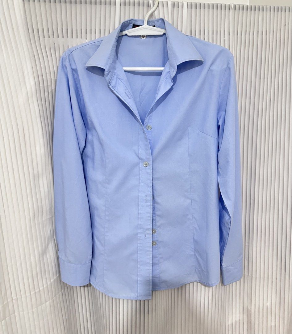 Light Blue Long Sleeve women (Category: Longsleeves) located in Bacoor. Submitted by clairenw68192 (Listing ID 1470057459, Image 2). Description: - Color: Light blue - Style: Long sleeves, classic collar, button-down - Length: 24 inches - Size: Fits S to M comfortably - Material: Clean and crisp - Versatility: Great for work or casual wear, easy to pair with skirts and trousers.