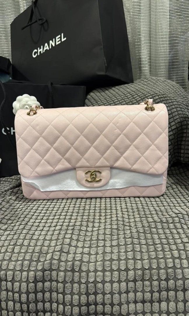 Chanel Classic Double Flap (Category: Luxury Bags & Wallets) located in Quezon City. Submitted by melmgpy (Listing ID 1470135223, Image 1). Description: Chanel Classic Double Flap Jumbo Color: Light Pink Material: Caviar Leather Hardware: Gold Hardware Comes with dust bag and Entrupy certificate of authenticity! SPECIAL PRICE DROP: Was: Php 557,000 Now Only: Php 499,000 Send a DM for sure buyers.
