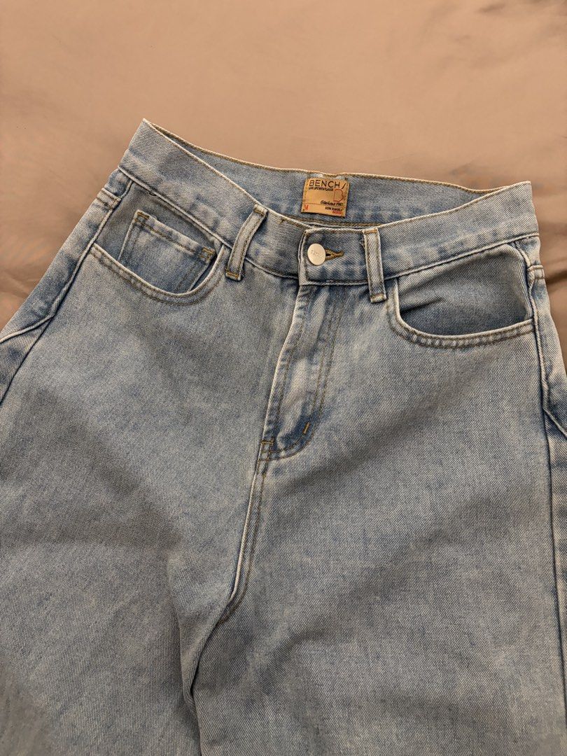 Light Wash Wide Leg Denim Jeans (Category: Jeans) located in Pasig City. Submitted by gdeclutterwithme (Listing ID 1470122176, Image 3). Description: - Brand: Bench - Style: Wide leg jeans with a relaxed fit - Color: Light wash blue - Size: M - Closure: Classic button fly and zip dm for more deets!.