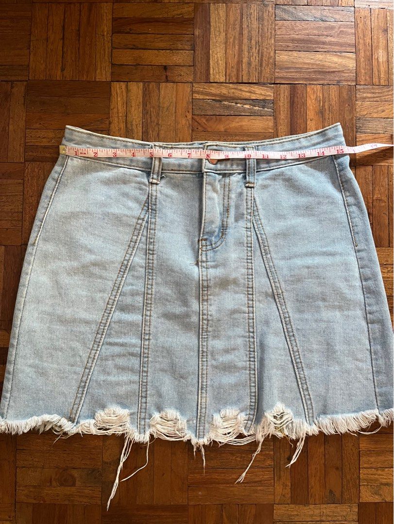 Lightwash Denim Raw Hem Mini Skirt (Category: Skirts) located in Makati City. Submitted by yoursecondbest (Listing ID 1469994080, Image 3). Description: Fits 30 waist..