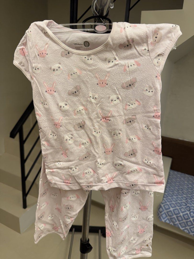 Littlebasics 18M Animal Print Pajama Set (Category: Babies & Kids Fashion) located in Manila. Submitted by __nix (Listing ID 1470006792, Image 1). Description: - Brand/Model: Littlebasics pajama set - Size: 18 Months - Design: Light pink with all-over rabbit and bear prints - Set includes: Short-sleeve top and matching long pants - Material: Soft cotton, machine washable - Condition: Gentle wear observed.