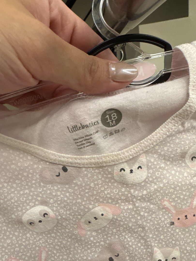 Littlebasics 18M Animal Print Pajama Set (Category: Babies & Kids Fashion) located in Manila. Submitted by __nix (Listing ID 1470006792, Image 2). Description: - Brand/Model: Littlebasics pajama set - Size: 18 Months - Design: Light pink with all-over rabbit and bear prints - Set includes: Short-sleeve top and matching long pants - Material: Soft cotton, machine washable - Condition: Gentle wear observed.