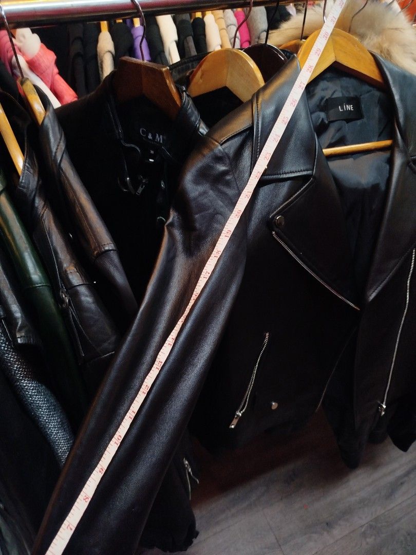 LÎNE Black Biker Leather Jacket (Category: Coats, Jackets and Outerwear) located in Quezon City. Submitted by cuteitemsonlyyy (Listing ID 1470101258, Image 3). Description: - Brand: LÎNE - Color: Classic Black - Material: Smooth faux leather with soft inner lining - Design: Asymmetric front zipper, lapel snap buttons, and zipped side pockets - Fit/Dimensions: Sleeve length approx. 22 inches, total length approx. 21 inches - Style: Timeless moto j