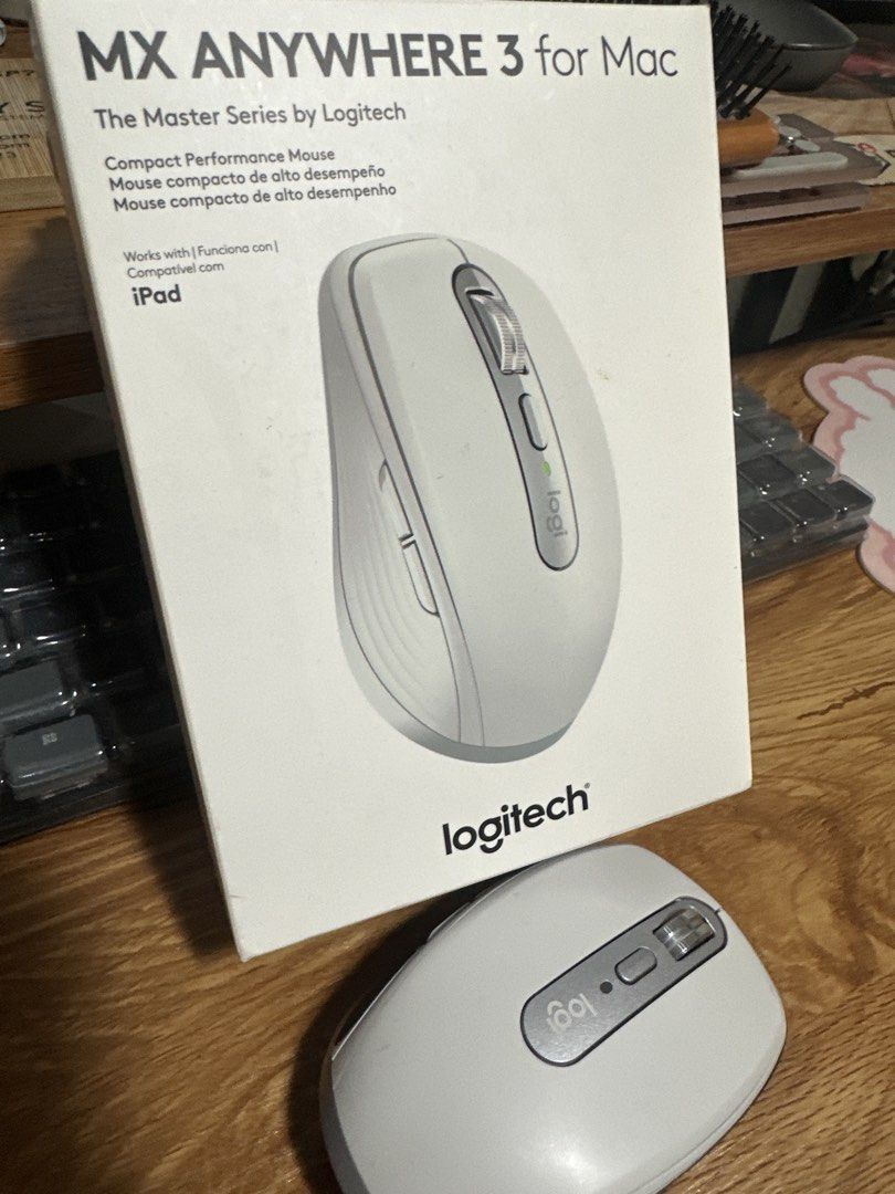 Logitech MX Anywhere 3 for Mac (Category: Mouse & Mousepads) located in Muntinlupa City. Submitted by clairebobot (Listing ID 1470139011, Image 3). Description: - Model: Logitech Wireless Mouse - Color: White and Silver with textured black side grips - Design: Ergonomic shape for comfortable daily use - Features: 2 extra thumb buttons for quick navigation - Condition: Great working condition for office or desktop setups - Inclusions: Original box