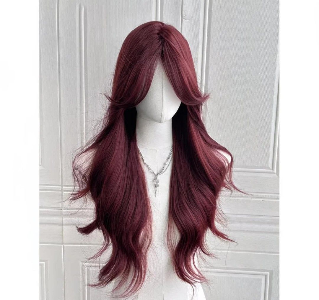Long Burgundy Wavy Wig with Curtain Bangs (Category: Hair Accessories) located in Makati City. Submitted by meghantherobot (Listing ID 1470112002, Image 1). Description: - Color: Rich burgundy - Style: Long with soft waves and face-framing curtain bangs - Parting: Center part - Length: Chest-length with thick, natural-moving fibers - Ideal for: Everyday styling, parties, or cosplay - Condition: Brand new.