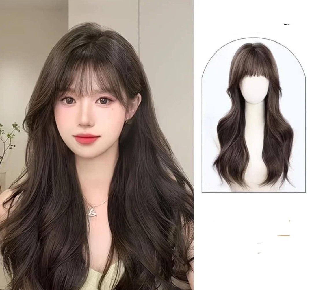 Long Wavy Wig With Bangs Dark Brown (Category: Hair Accessories) located in Makati City. Submitted by meghantherobot (Listing ID 1470112033, Image 1). Description: - Style: Long wavy wig with soft bangs and face-framing layers - Color: Dark brown with subtle highlights - Texture: Soft and natural movement - Benefit: Instantly changes up your look with zero commitment.