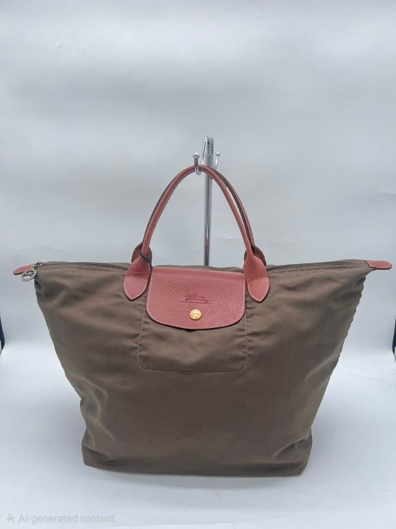 Longchamp Le Pliage Short Handle Tote Bag - Large (Category: Tote Bags) located in Quezon City. Submitted by gbabesy (Listing ID 1469957665, Image 1). Description: olive green in color no rubs on corners.
