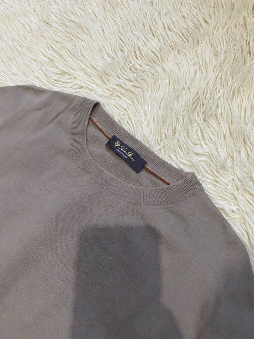 Loro Piana (Category: Tshirts & Polo Shirts ) located in Manila. Submitted by switchcity (Listing ID 1470075975, Image 2). Description: - Brand: Loro Piana - Color: Taupe Grey - Size: M (Tag Code: FAI6176-D00A) - Material: 100% Cotton (Made in Italy) - Design: Short sleeves, classic crewneck collar, ribbed cuffs and hem - Feel: Soft knit fabric, lightweight, and versatile neutral shade.