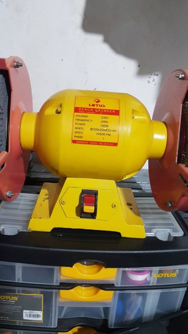 Lotus 8" Bench Grinder LBG-200C 350W (Category: Construction Tools & Equipment) located in Las Pinas. Submitted by mightyearth_4feb1b (Listing ID 1470036663, Image 3). Description: - Brand: Lotus - Model: LBG-200C (8-inch Bench Grinder) - Power: 350W, 230V, 60Hz, Single Phase - Speed: 3450 RPM - Wheel Size: 200x20x32mm - Color: Yellow and Red - Condition: Comes with original box - Perfect for sharpening, shaping, and metalworking.