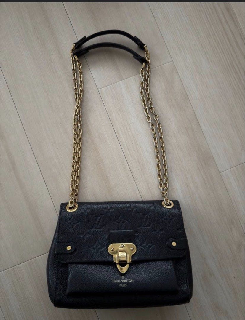 Louis Vuitton Black Vavin BB (Category: Luxury Bags & Wallets) located in Las Pinas. Submitted by nihonluxxe88 (Listing ID 1470058034, Image 2). Description: - Authentic Louis Vuitton Monogram Empreinte leather bag in timeless black - Elegant gold-tone chain strap and secure front lock closure - Structured design featuring a convenient front slip pocket - Features the iconic clear debossed LV monogram pattern - Includes matching orange Louis Vuit