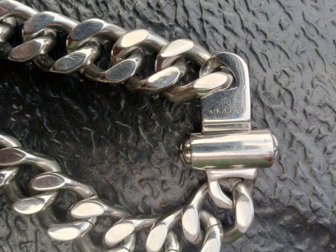 Authentic Louis Vuitton Monogram Chain Necklace M68273 (Category: Luxury Accessories) located in Malolos. Submitted by lizarondoe59660 (Listing ID 1470099846, Image 1). Description: - Brand: Louis Vuitton - Model: M68273 - Finish: Polished silver with solid weight - Design: Chunky link style with engraved Monogram pattern - Closure: Secure clasp featuring LV logo square detail - Styling: Perfect to wear solo or layered - Condition: 100% authentic