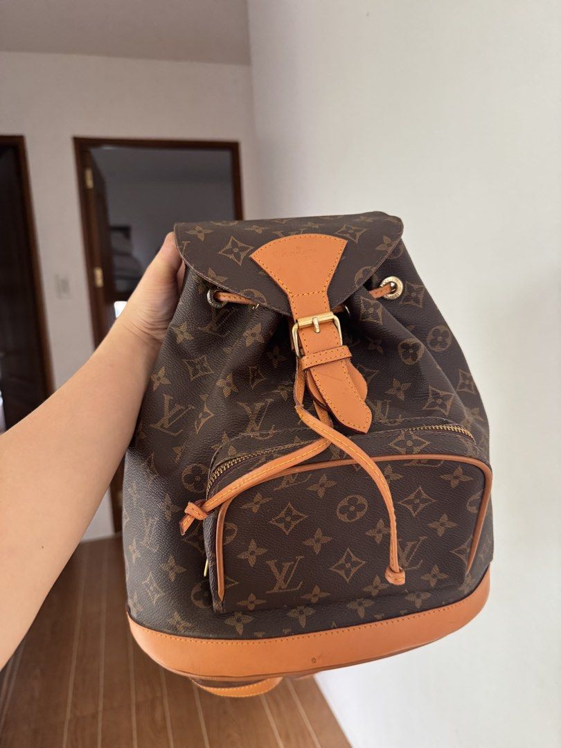 Louis Vuitton Monogram Palm Springs Backpack (Category: Luxury Bags & Wallets) located in Rizal. Submitted by mharieshine (Listing ID 1470067652, Image 1). Description: - Authentic Louis Vuitton Monogram canvas backpack - Classic monogram print with durable brown leather trim - Secure drawstring closure under flap with buckle detail - Convenient front zipped pocket and structured base - Adjustable shoulder straps and sturdy top handle - Clean int