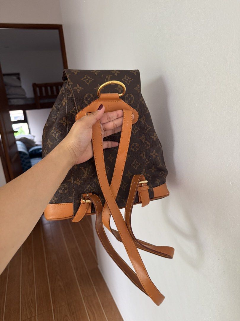 Louis Vuitton Monogram Palm Springs Backpack (Category: Luxury Bags & Wallets) located in Rizal. Submitted by mharieshine (Listing ID 1470067652, Image 2). Description: - Authentic Louis Vuitton Monogram canvas backpack - Classic monogram print with durable brown leather trim - Secure drawstring closure under flap with buckle detail - Convenient front zipped pocket and structured base - Adjustable shoulder straps and sturdy top handle - Clean int