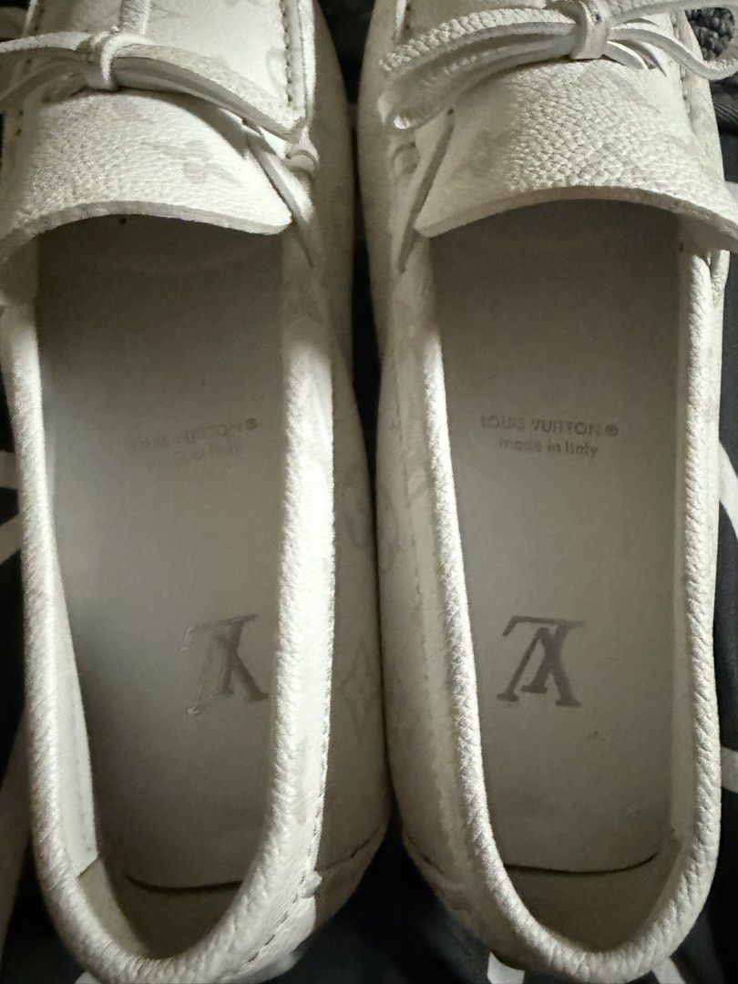 Louis Vuitton Monogram White Leather Loafers Size 7 (Category: Loafers) located in Manila. Submitted by patricio8717515 (Listing ID 1470087937, Image 2). Description: - Brand: Louis Vuitton - Style: White leather monogram loafers / driving shoes - Size: 7 (stamped inside) - Material: Premium white leather with debossed monogram pattern and durable rubber outer soles - Features: Slip-on design with laces, LV branding on insoles and back heels - Or