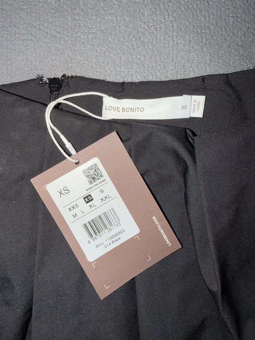 Love Bonito Black Midi Skirt (Category: Skirts) located in Quezon City. Submitted by spicycalimaki (Listing ID 1470051955, Image 2). Description: - size XS (24 waistline) - brand new, with tag - last price posted (SRP: ₱2k+) 🏷️ zara h&m mango uniqlo monki cotton on urban revivo bershka pull & bear love bonito editors market carino.