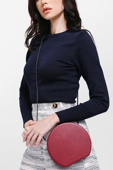 Love Bonito Navy Blue Ruffle Knit Top (Category: Sleeveless) located in Calamba. Submitted by cheriiv (Listing ID 1469953097, Image 1). Description: Washed, never worn - Brand: Love Bonito - Color: Classic navy blue - Size: M (UK 10, US 6) - Design: Round neckline with a chic ribbed ruffle detail on the right shoulder and chest - Fit: Fitted silhouette with ribbed cuffs and hem - Material: Clean, soft fabric with great stretch - Styling: Versatil