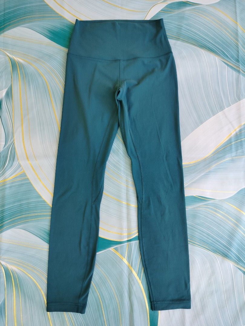 Lululemon Align High-Rise Leggings Teal Size 4 (Category: Activewear) located in Manila. Submitted by geraldquinto_917 (Listing ID 1470079438, Image 3). Description: - Brand: Lululemon - Size: 4 (tag confirmed in waistband pocket) -Length 33 - Color: Rich teal - Rise: High-rise for maximum comfort and support - Details: Signature logo on the back waistband, hidden pocket - Condition: Excellent, buttery soft fabric - Best for: Workouts, yoga, or e