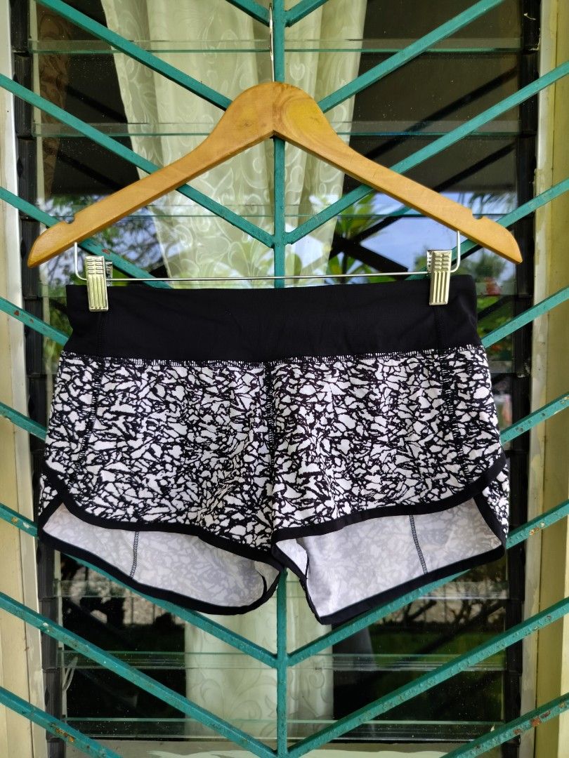 Lululemon Athletic Shorts Black White Size 4 (Category: Shorts) located in Manila. Submitted by geraldquinto_917 (Listing ID 1470074309, Image 1). Description: - Brand: Lululemon - Size: 4 -Waist 28-34 - Color/Design: Black and white abstract print - Features: Wide waistband, built-in liner, and a convenient zippered back pocket - Style: Classic running shorts - Condition: Great pre-loved condition (ready to wear!) - Perfect for: Gym workouts, ru