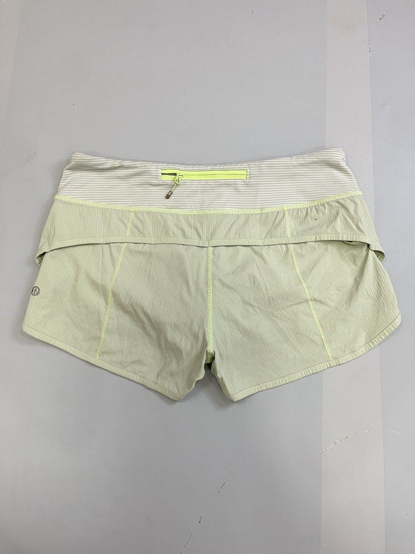 Lululemon Athletic Shorts Light Green Size 6 (Category: Shorts) located in Mabalacat. Submitted by aas_thriftfings (Listing ID 1470102945, Image 2). Description: - Brand: Lululemon - Color: Light green with lime green accent stitching - Size: 6 (verified by size dot inside pocket) - Features: Striped waistband, secure back zipper pocket with pull tab, and built-in liner - Fabric: Lightweight, breathable, and comfortable for running or active wear