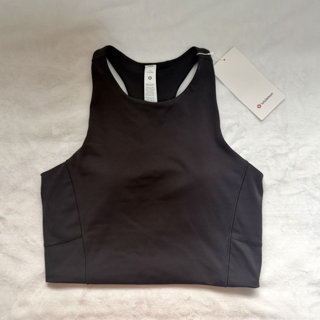 Lululemon Crop Tank 10 (Category: Activewear) located in Quezon City. Submitted by lovedbysia (Listing ID 1469977840, Image 1). Description: - Brand: Lululemon - Item: Swift Speed Cropped Tank - Color: Black - Size: 10 - Condition: Brand new with original tags attached - Support: Built-in shelf bra with medium support - Fabric: Smooth, quick-dry material with a matte finish - Features: Convenient zippered back pocket (fits a phone) and racerback 