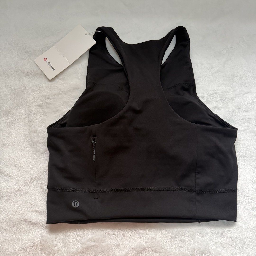 Lululemon Crop Tank 10 (Category: Activewear) located in Quezon City. Submitted by lovedbysia (Listing ID 1469977840, Image 2). Description: - Brand: Lululemon - Item: Swift Speed Cropped Tank - Color: Black - Size: 10 - Condition: Brand new with original tags attached - Support: Built-in shelf bra with medium support - Fabric: Smooth, quick-dry material with a matte finish - Features: Convenient zippered back pocket (fits a phone) and racerback 