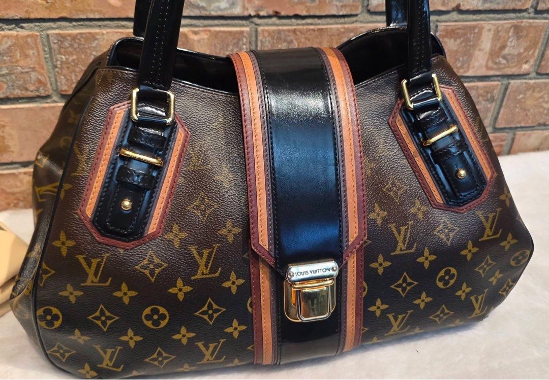 LV MIRAGE NOIR (Category: Luxury Bags & Wallets) located in Cotabato. Submitted by zyvenza.co (Listing ID 1470037839, Image 2). Description: LV MIRAGE NOIR (mono limitted edition) 22k With auth certificates With Dustbag Measurements: Approx *L: 17" (at base) *L: 11" ( at top) × H: 9.5" x W: 8" *Handle Drop: 6.5".