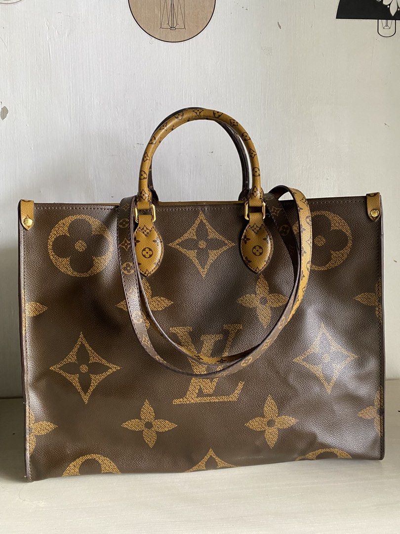 Lv monogram reverse tote (Category: Luxury Bags & Wallets) located in Cavite. Submitted by wildowl-0f14 (Listing ID 1469969472, Image 1). Description: - Brand: Louis Vuitton - Style: Monogram Reverse Tote Bag - Condition: Good (7/10) - Design: Iconic reverse monogram canvas with gold-tone hardware - Straps: Dual top handles and shoulder straps - Interior: Vibrant red fabric lining with zipper and slip compartments - Spacious and versatile for dai