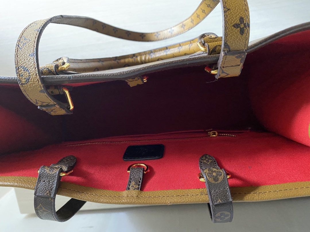 Lv monogram reverse tote (Category: Luxury Bags & Wallets) located in Cavite. Submitted by wildowl-0f14 (Listing ID 1469969472, Image 3). Description: - Brand: Louis Vuitton - Style: Monogram Reverse Tote Bag - Condition: Good (7/10) - Design: Iconic reverse monogram canvas with gold-tone hardware - Straps: Dual top handles and shoulder straps - Interior: Vibrant red fabric lining with zipper and slip compartments - Spacious and versatile for dai