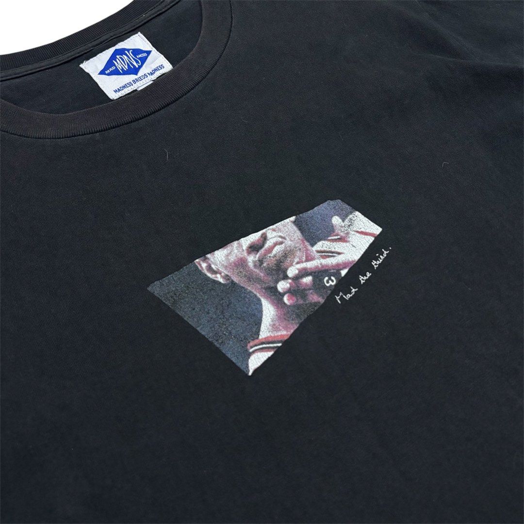 Madness MDNS Graphic Tee (Category: Tshirts & Polo Shirts ) located in Quezon City. Submitted by grailph (Listing ID 1470064311, Image 2). Description: - Brand: Madness - Color: Black - Size: Large - Dimension: 21”x26” - Design: 'Mad the third' graphic print on chest - Details: Woven brand patch on interior collar and back exterior - Material: Comfortable cotton with crew neck and short sleeves - Condition: Clean, solid streetwear vibe Color rate