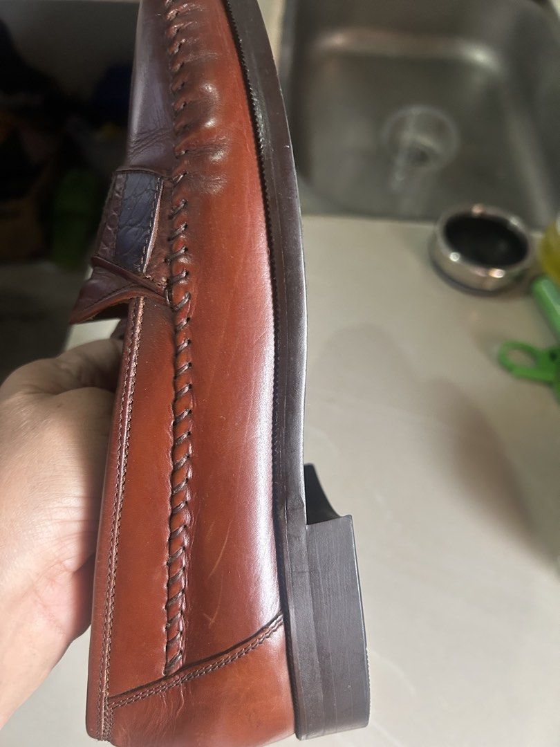 madras Modello casual shoes size 26 (Category: Casual Shoes) located in Cavite. Submitted by cecitrifthshop (Listing ID 1469955672, Image 2). Description: pair of Madras Modello men's leather loafers made in Japan, featuring a reddish-brown smooth leather body with textured faux crocodile leather accents strap size 26 like new made in japan .